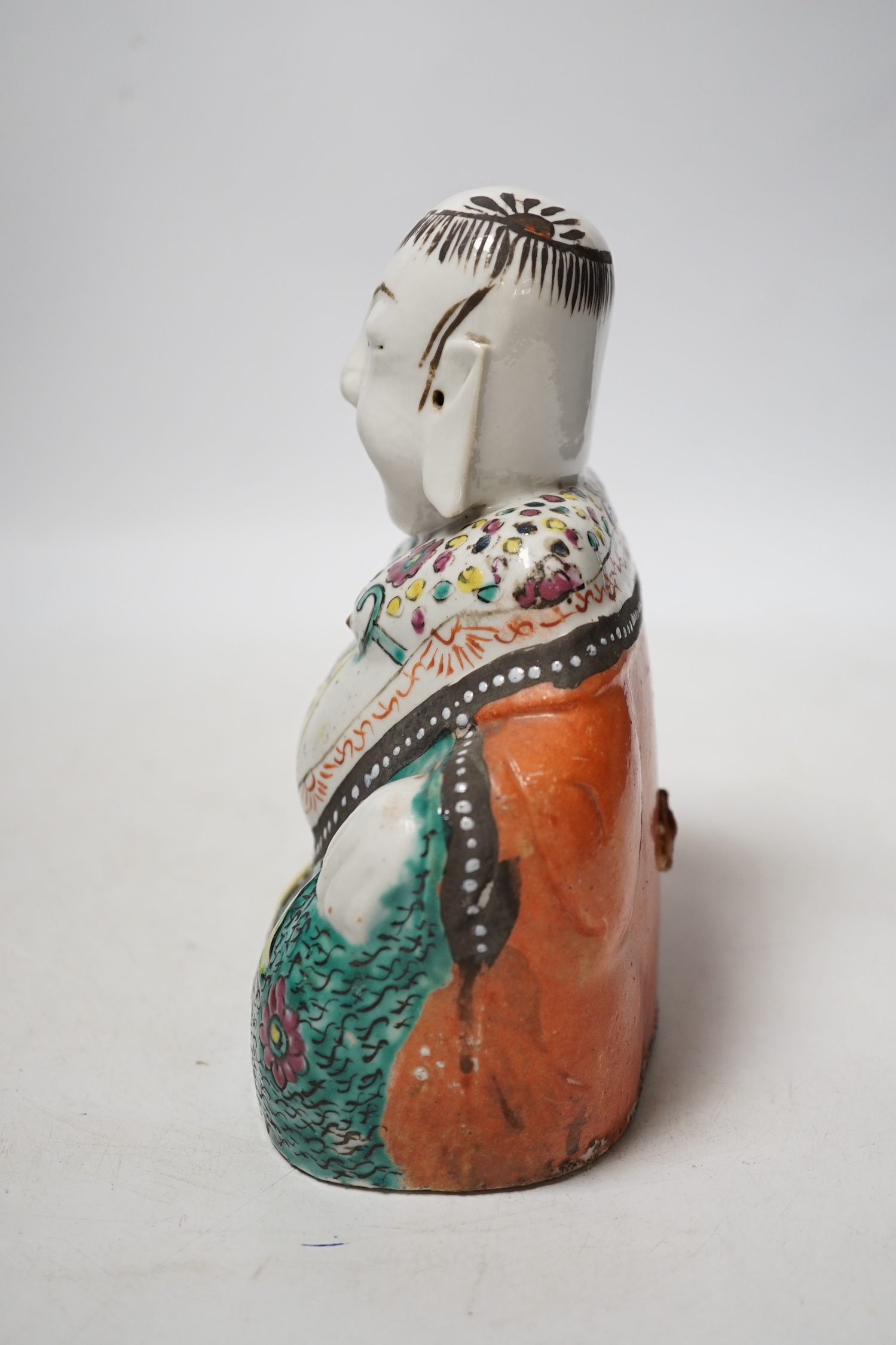 A Chinese enamelled porcelain figure of Budai, late 18th/early 19th century, 18cm high
